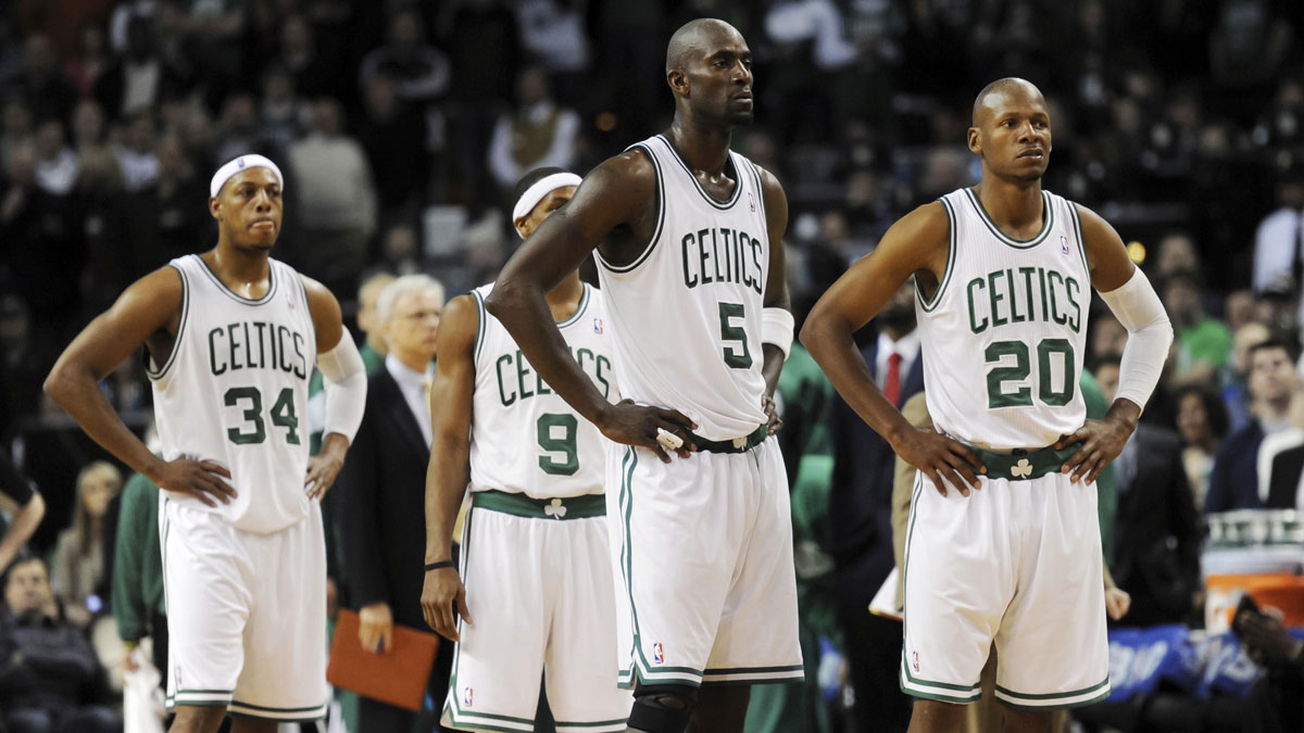 Boston Celtics players Paul Pierce (34) , Rajon Rondo (9) , Kevin Garnett (5) and Ray Allen (20) await the start of overtime against the New York Knicks at TD Garden.