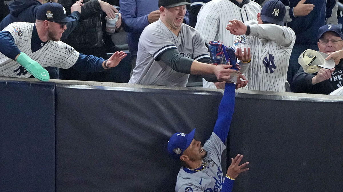 Los Angeles Dodgers outfielder Mookie Betts (50) makes a catch in foul terriotory against the New York Yankees in the first inning during game four of the 2024 MLB World Series at Yankee Stadium. 