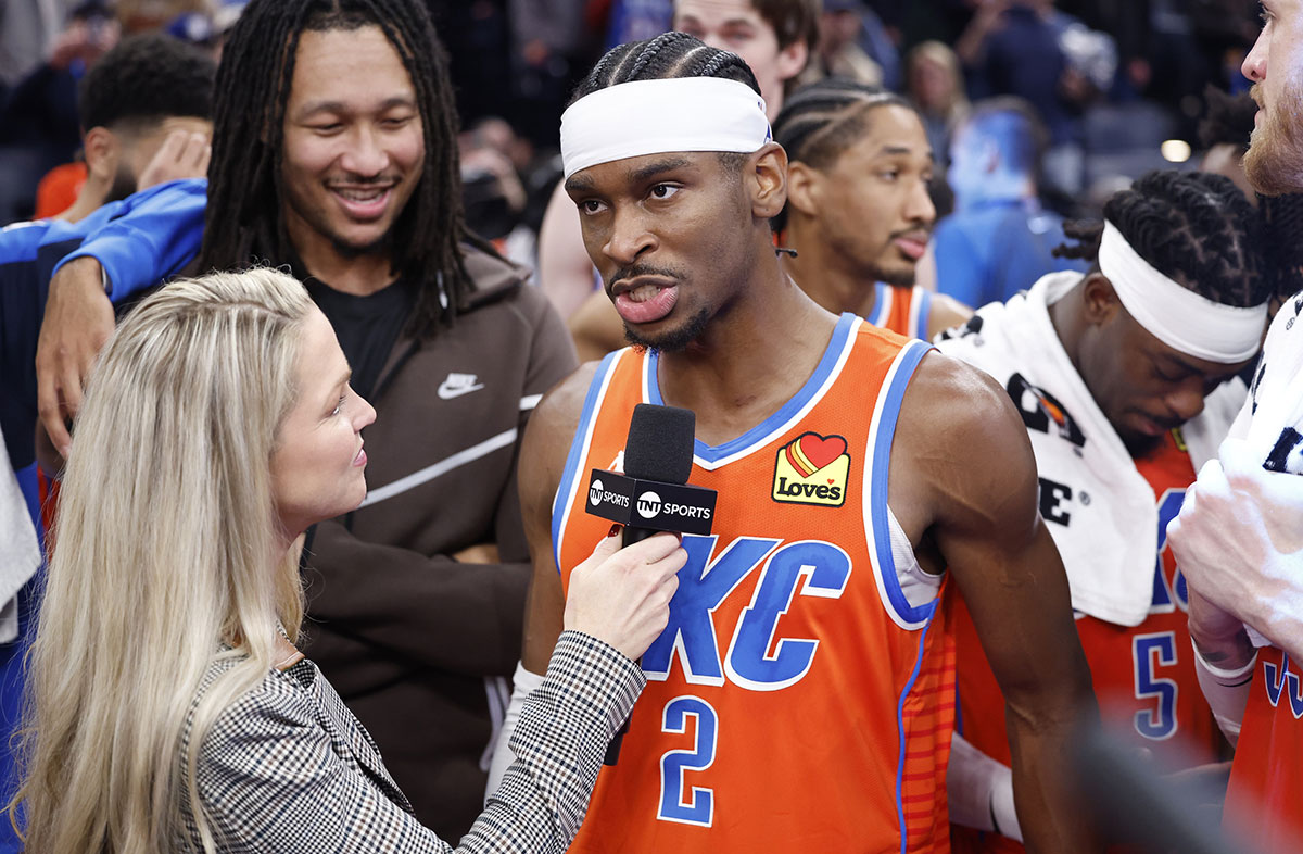 Thunder guard Shai Gilgeous-Alexander (2) speaks to a tv reporter after his team defeated the Dallas Mavericks at Paycom Center