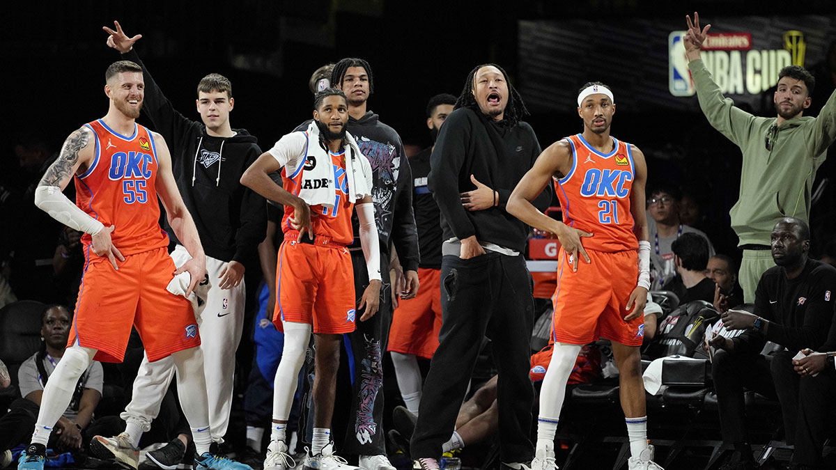 The Oklahoma City Thunder bench reacts during the fourth quarter against the Houston Rockets in a semifinal of the 2024 Emirates NBA Cup at T-Mobile Arena.