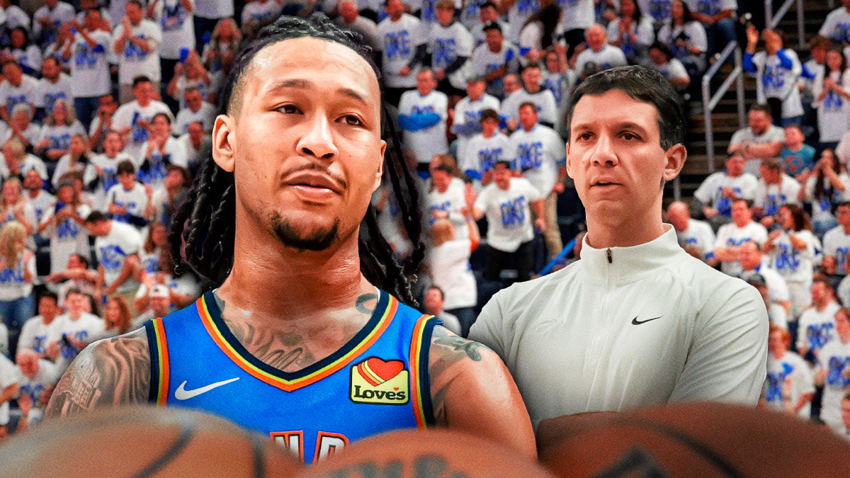 Thunder center Jaylin Williams next to Thunder head coach Mark Daigneault with Thunder fans inside the Paycom Center the background