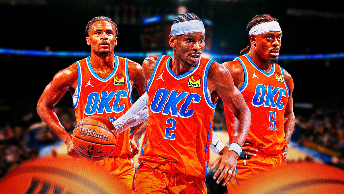 Thunder All-Star Shai Gilgeous-Alexander between Thunder guard Lu Dort and Thunder guard Cason Wallace