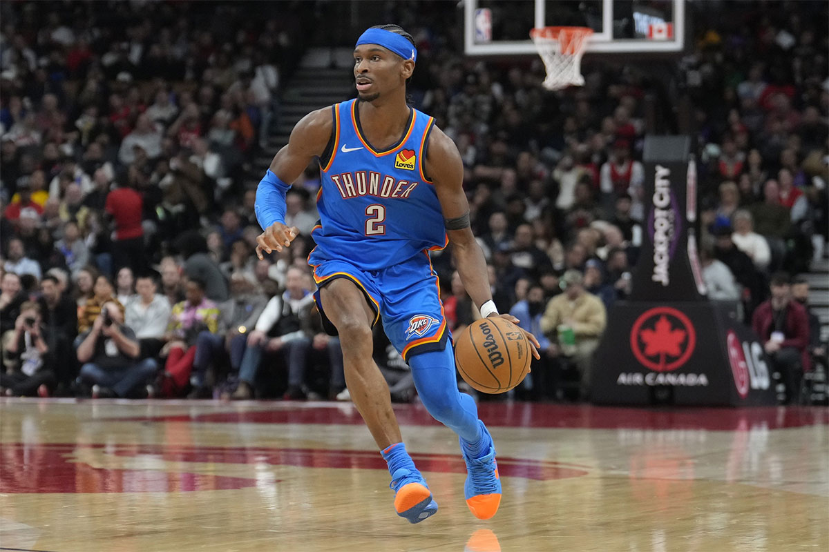 Oklahoma City Thunder guard Shai Gilgeous-Alexander (2) dribbles the ball against the Toronto Raptors during the second half at Scotiabank Arena.