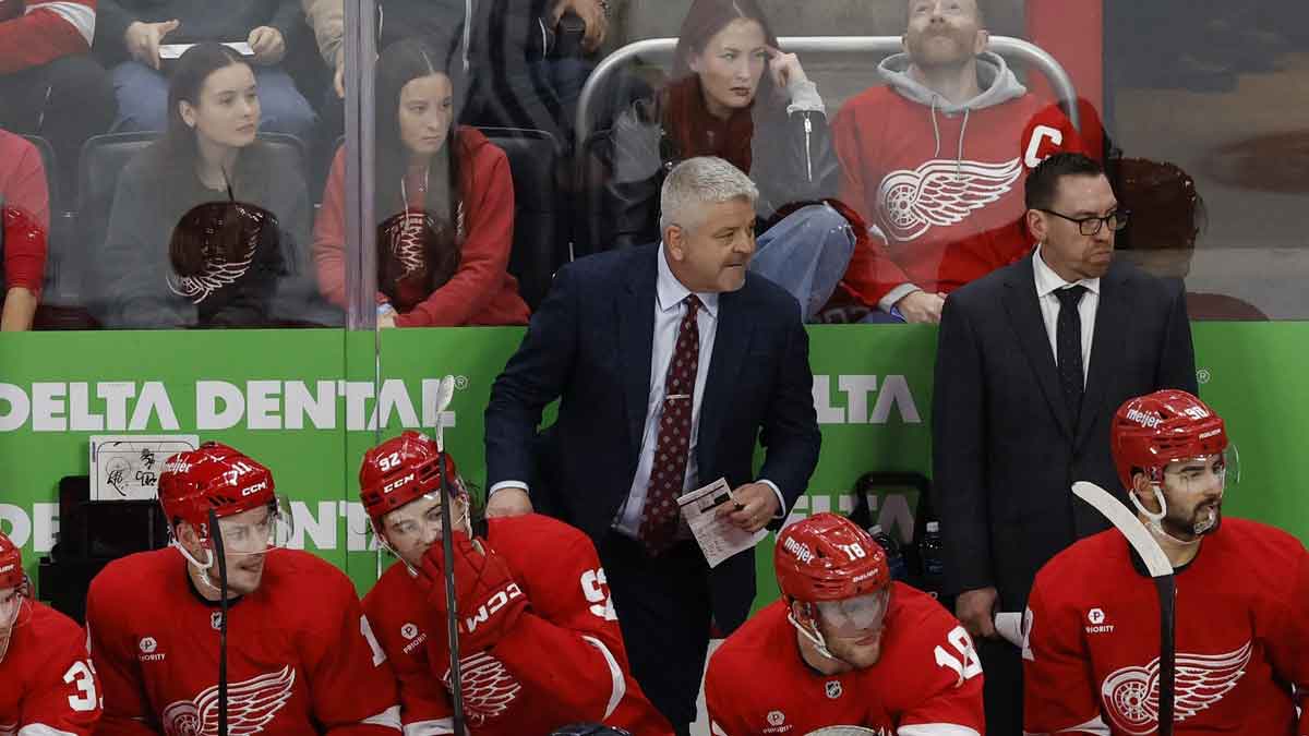 Detroit Red Wings head coach Todd McLellan (center) stands on the bench in the third period against the Toronto Maple Leafs at Little Caesars Arena.