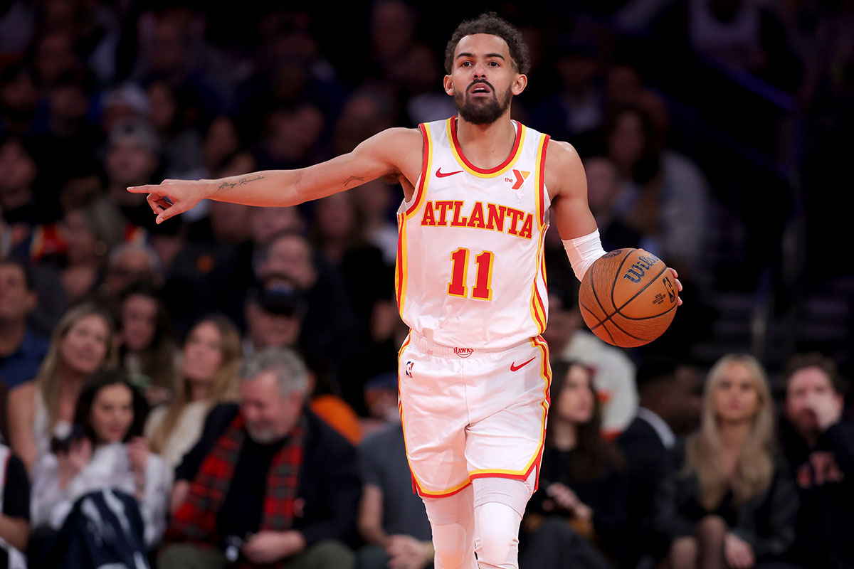 Atlanta Hawks guard Trae Young (11) brings the ball up court against the New York Knicks during the second quarter at Madison Square Garden.