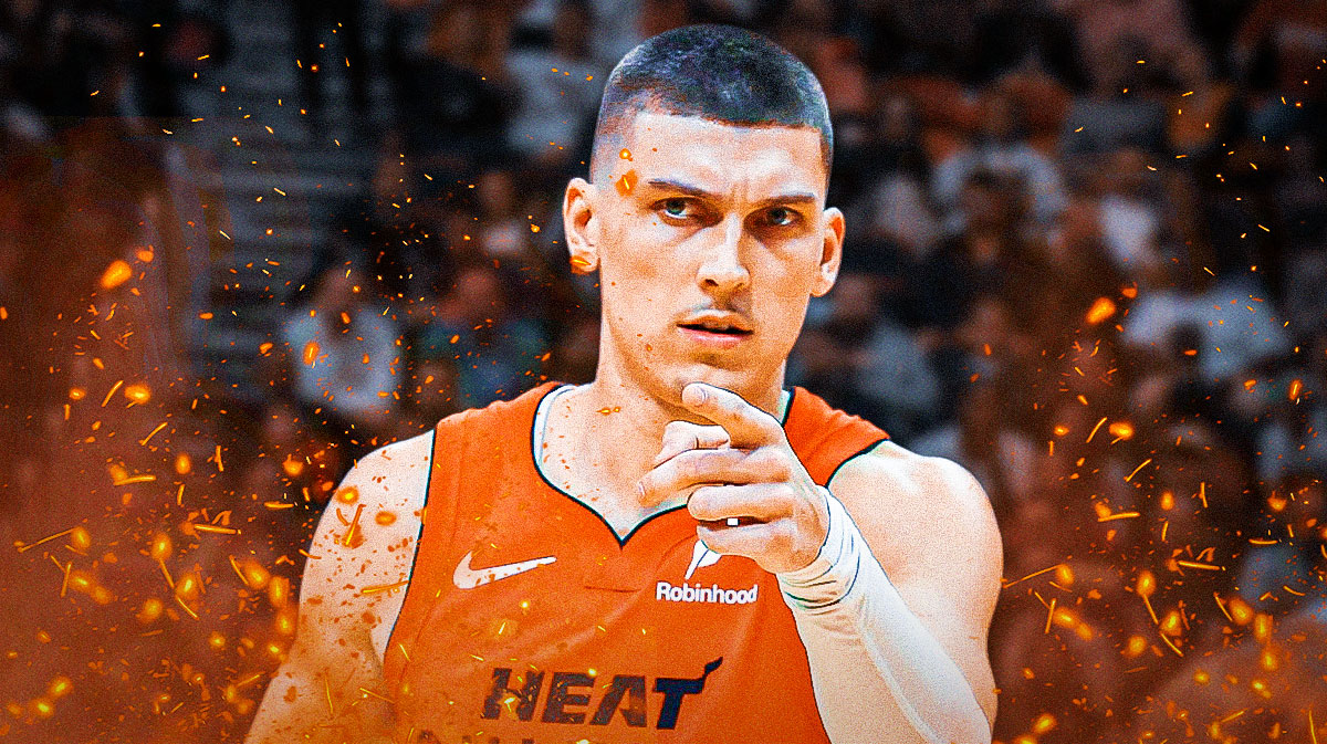 Miami Heat star Tyler Herro in front of Kaseya Center.