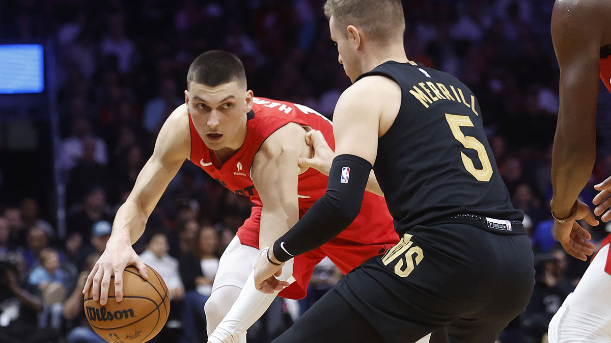 Cleveland Cavaliers guard Sam Merrill (5) defends Miami Heat guard Tyler Herro (14) during the second half at Kaseya Center.