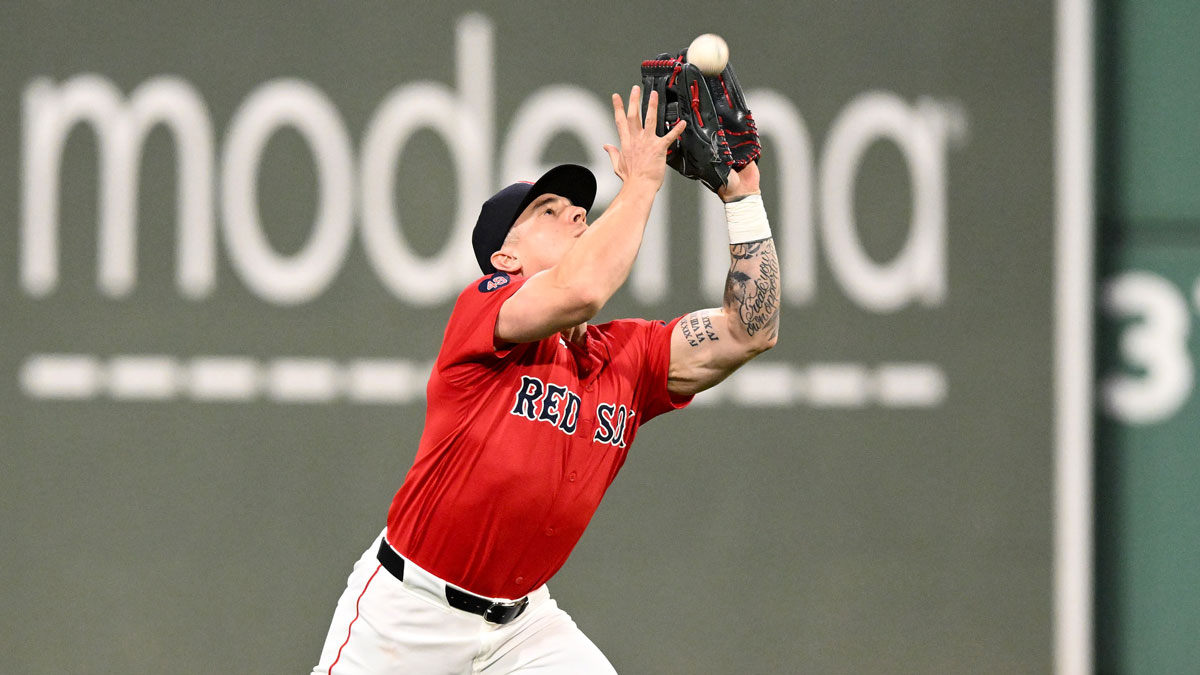 Boston Red Sox left fielder Tyler O'Neill (17) makes a catch for an out during the fifth inning of a game against the Chicago White Sox at Fenway Park. 