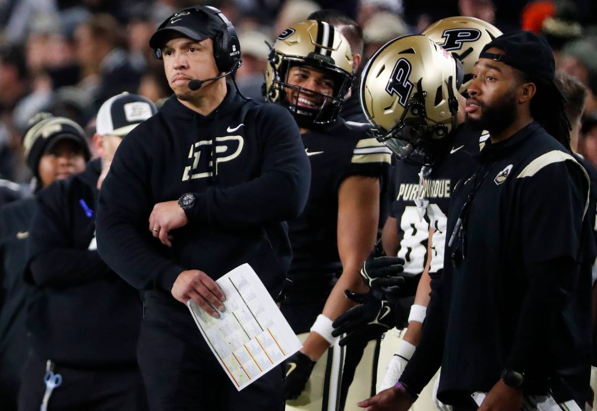Purdue Boilermakers head coach Ryan Walters looks down field