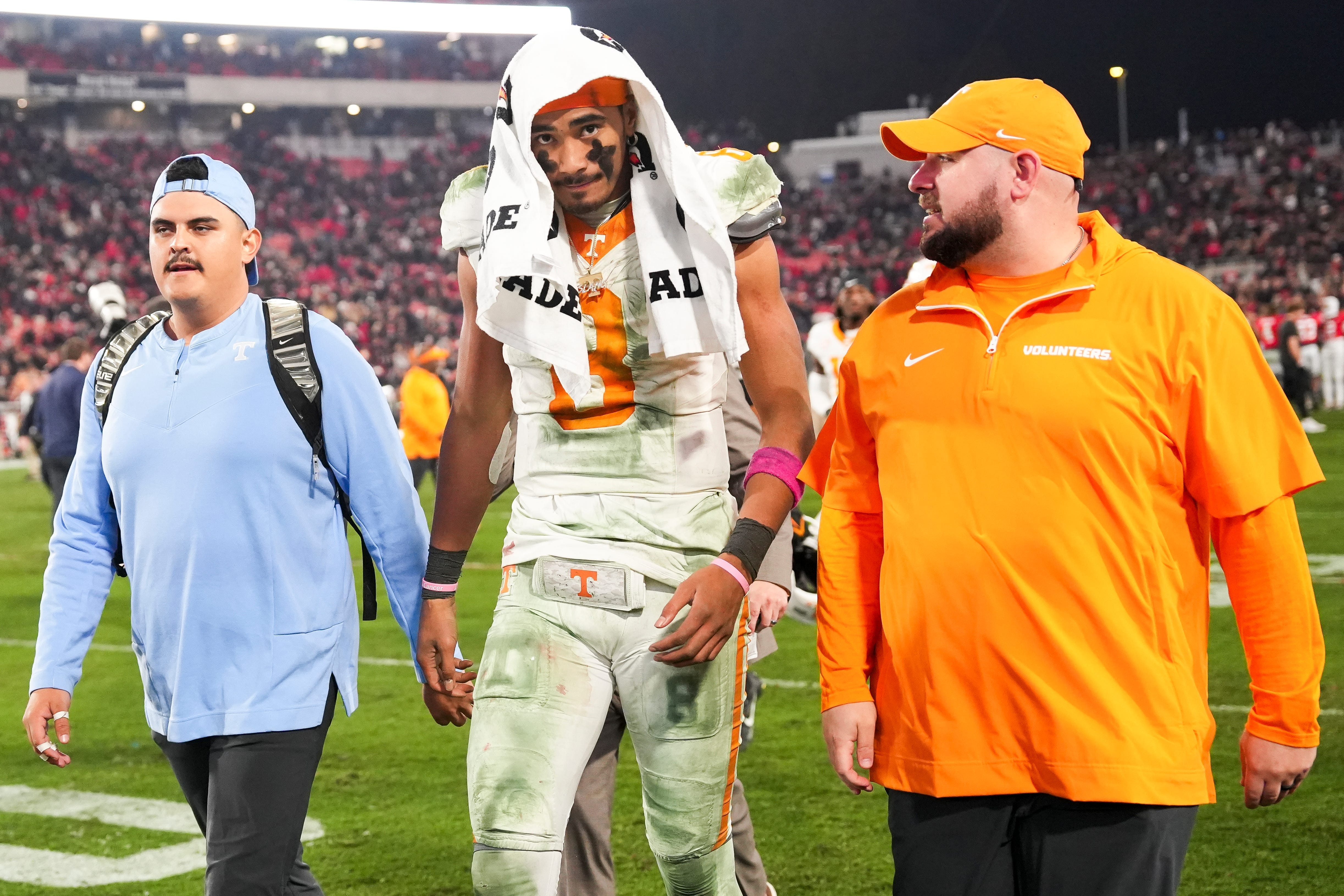 Tennessee quarterback Nico Iamaleava (8) walks off the field after his team's game against Georgia at Sanford Stadium