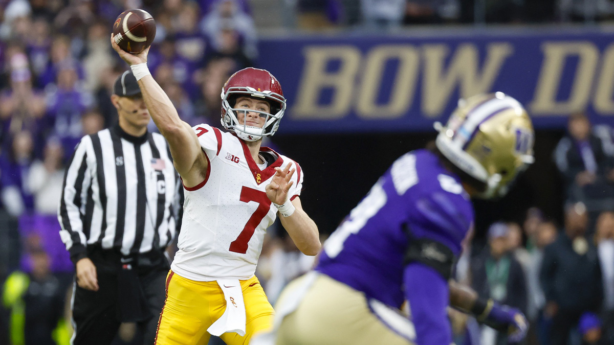 USC Trojans quarterback Miller Moss (7) passes against the Washington Huskies during the first quarter at Alaska Airlines Field at Husky Stadium