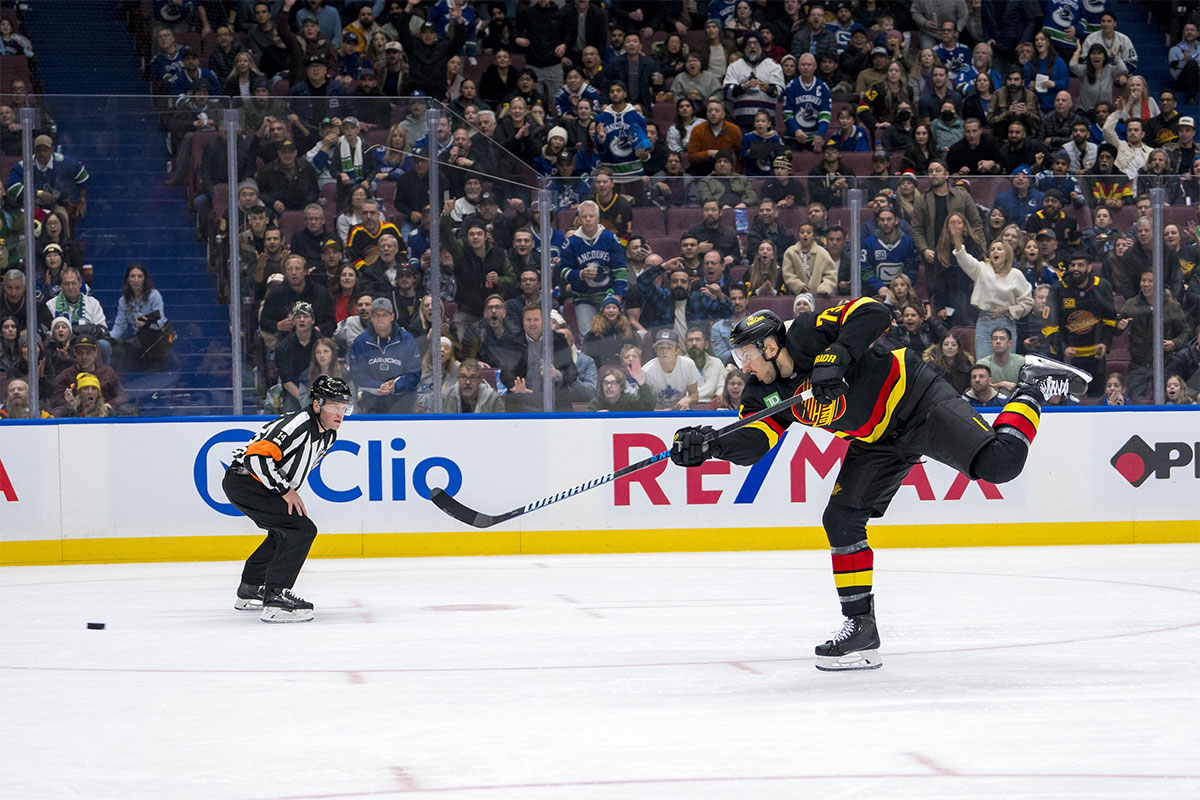Vancouver Canucks defenseman Vincent Desharnais (73) shoots on a breakaway attempt against the Columbus Blue Jackets during the second period at Rogers Arena.