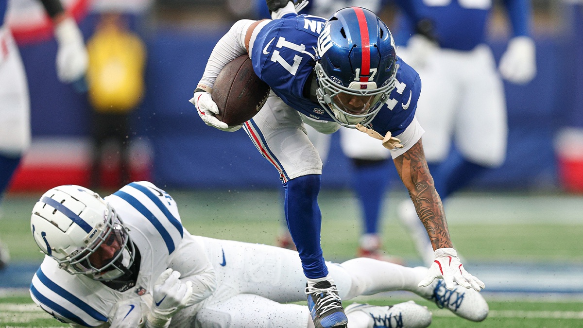 New York Giants wide receiver Wan'Dale Robinson (17) breaks a tackle by Indianapolis Colts safety Julian Blackmon (32) during the second half at MetLife Stadium.