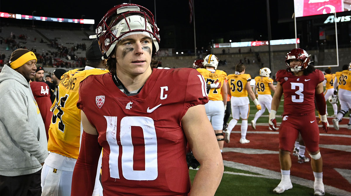 Washington State Cougars quarterback John Mateer (10) walks off the field after a game against the Wyoming Cowboys at Gesa Field at Martin Stadium. Washington State Cougars won 15-14.