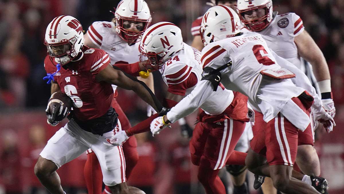Wisconsin wide receiver Will Pauling (6) picks up ten yards on a reception during the first quarter against Nebraska at Camp Randall Stadium in Madison on November 18, 2023.