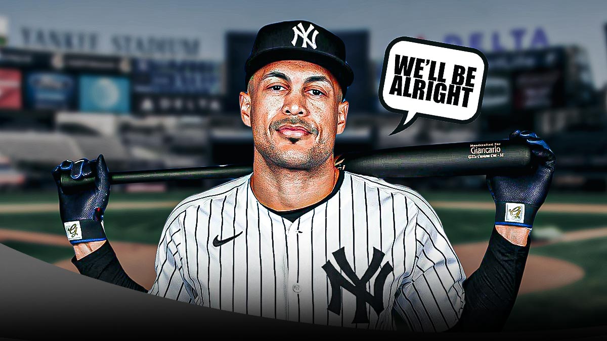 Giancarlo Stanton (Yankees) holding a bat, speech bubble says "we'll be alright" Yankee Stadium background