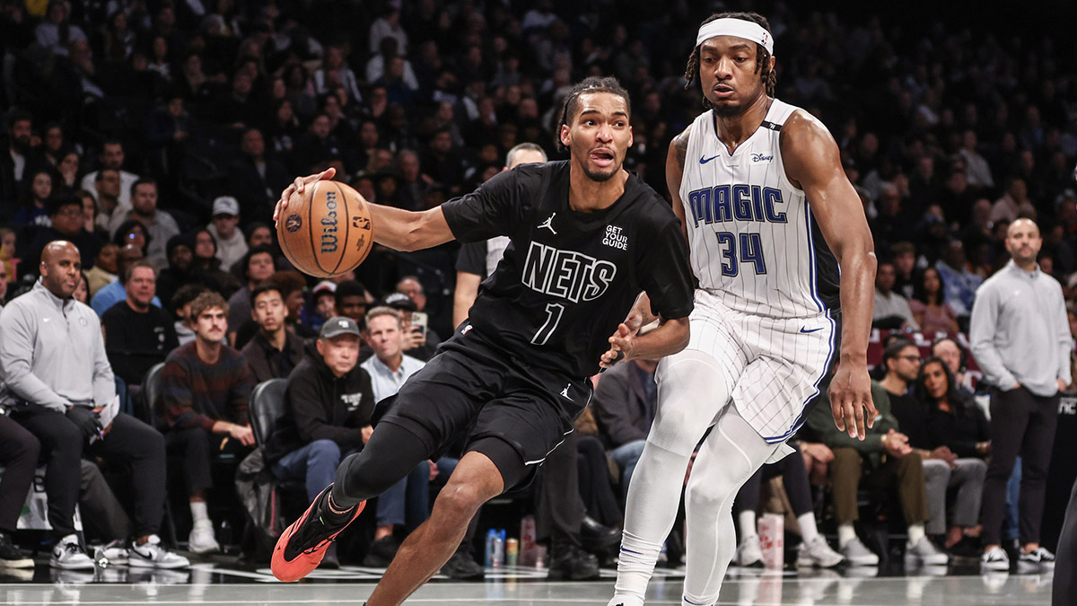 Brooklyn Nets forward Ziaire Williams (1) drives past Orlando Magic center Wendell Carter Jr. (34) in the second quarter at Barclays Center.