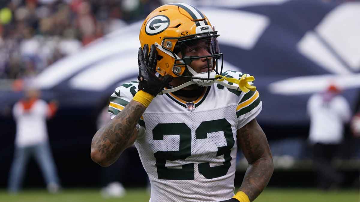 Green Bay Packers cornerback Jaire Alexander (23) gestures to the fans before the game against the Chicago Bears at Soldier Field. 