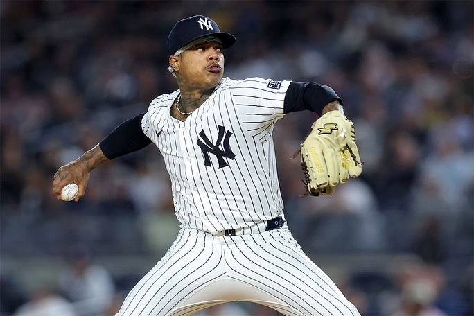 New York Yankees starting pitcher Marcus Stroman (0) throws against the Baltimore Orioles in the first inning at Yankee Stadium. 