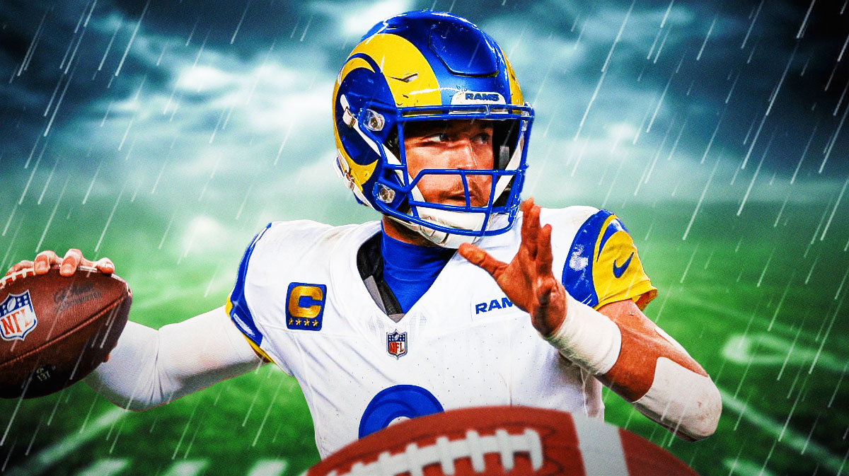 Los Angeles Rams quarterback Matthew Stafford making a throw in the rain