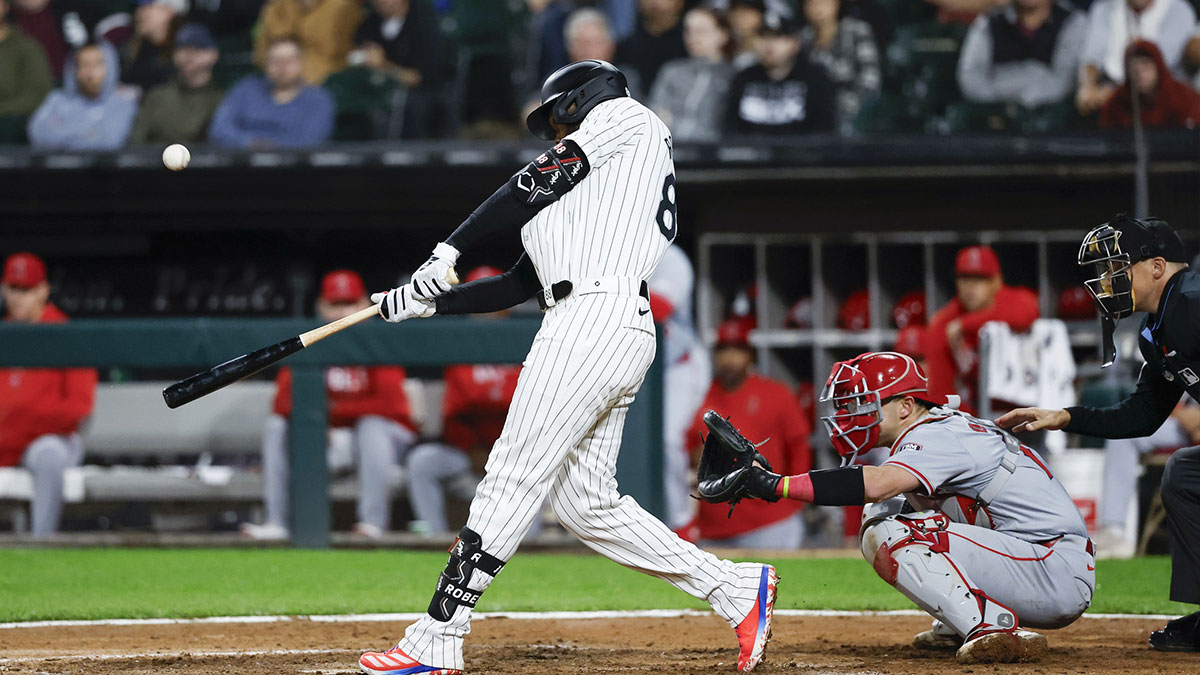 Chicago White Sox outfielder Luis Robert Jr. (88) hits an RBI-single against the Los Angeles Angels during the eight inning at Guaranteed Rate Field.