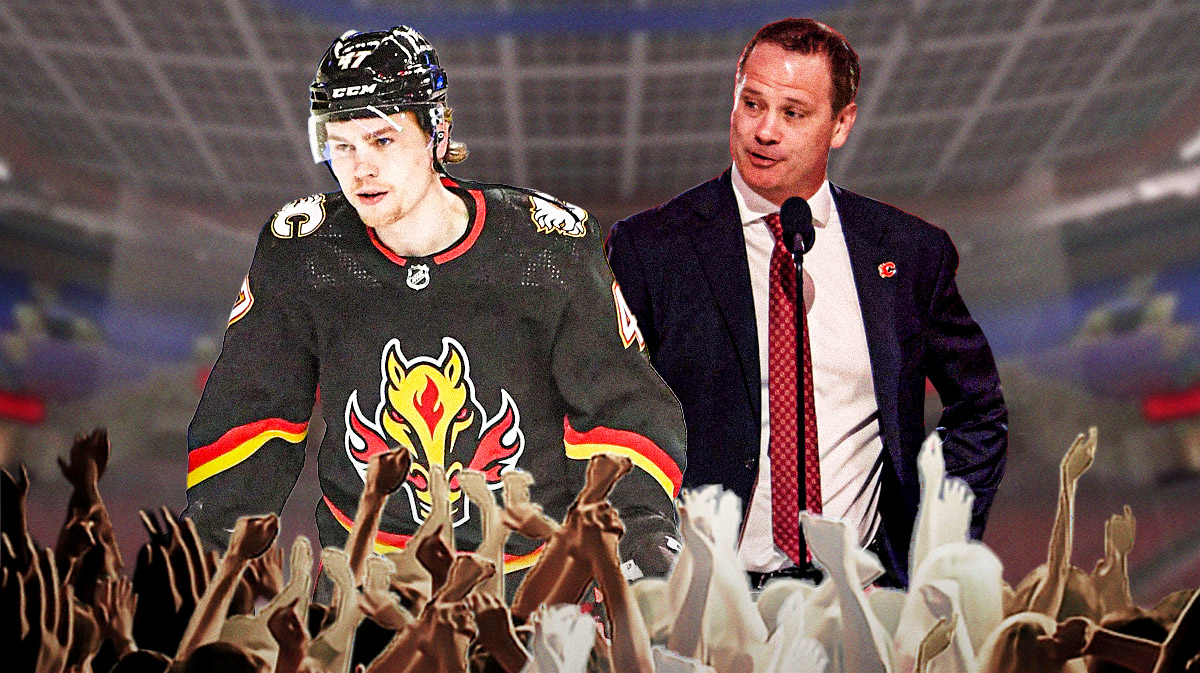 Flames forward Connor Zary and GM Craig Conroy inside the Scotiabank Saddledome