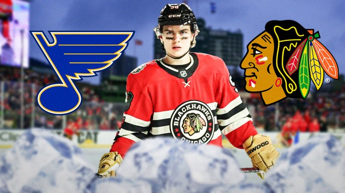 Chicago Blackhawks center Connor Bedard in center, St. Louis Blues logo on right side, Chicago Blackhawks logo on left side, Wrigley Field (home of the 2025 NHL Winter Classic) in background