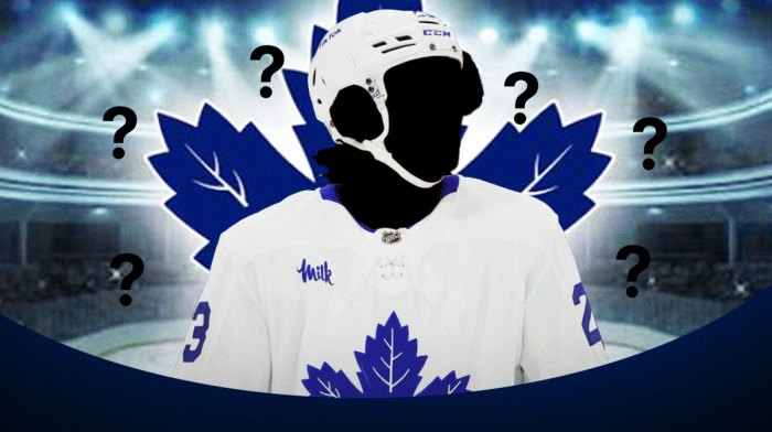 A silhouetted player in a Toronto Maple Leafs jersey, Toronto Maple Leafs logo, 3-5 question marks, hockey rink in background