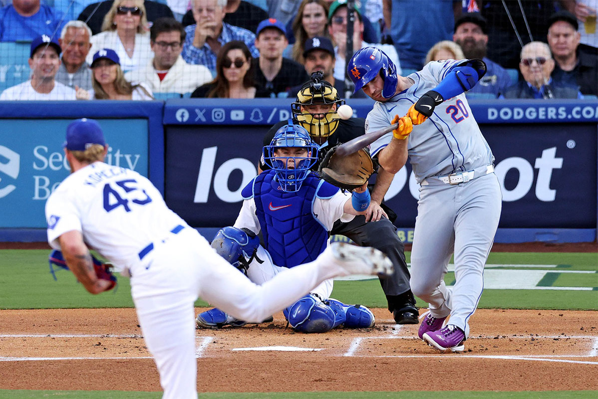 New York Mets first baseman Pete Alonso (20) hits and reaches first base on an error during the first inning against the Los Angeles Dodgers during Game 6 of the 2024 MLB Playoffs NLCS at Dodger Stadium. 