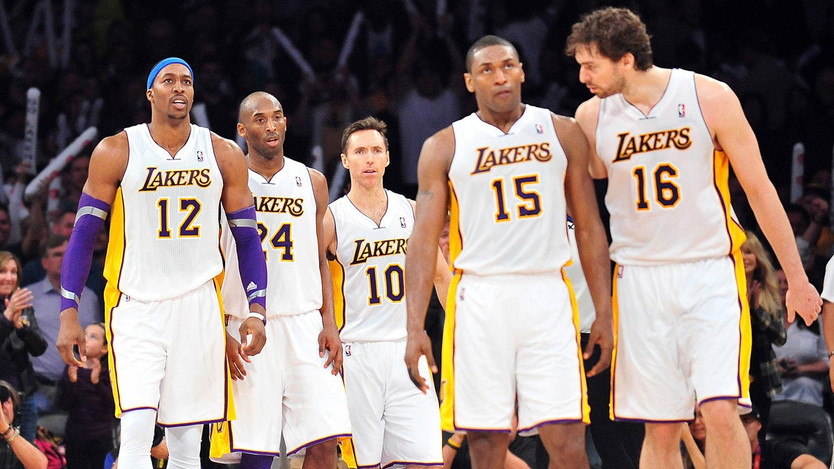 Los Angeles Lakers center Dwight Howard (12), shooting guard Kobe Bryant (24), point guard Steve Nash (10), small forward Metta World Peace (15) and power forward Pau Gasol (16) during a stoppage in play against the Oklahoma City Thunder during the second half at Staples Center.