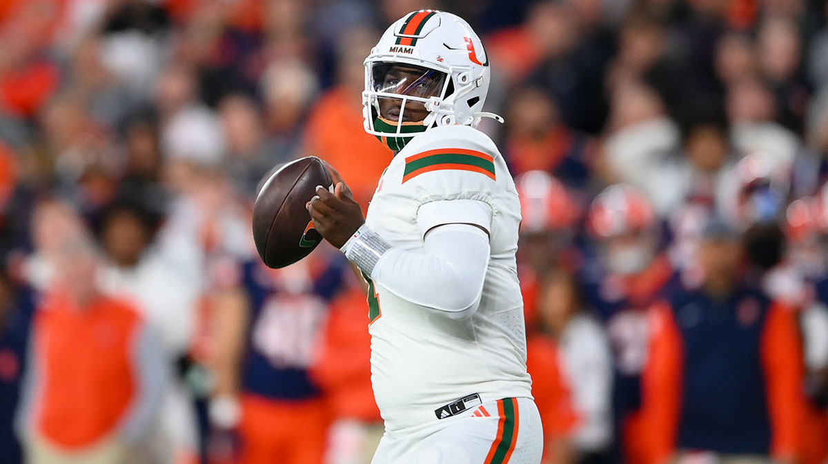Miami Hurricanes quarterback Cam Ward (1) looks to pass against the Syracuse Orange during the first half at the JMA Wireless Dome.