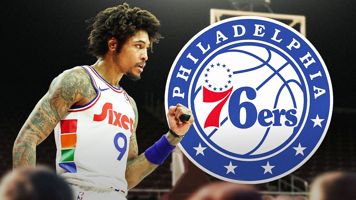 Philadelphia 76ers player Kelly Oubre Jr with the Sixers logo in the background, Yves Missi