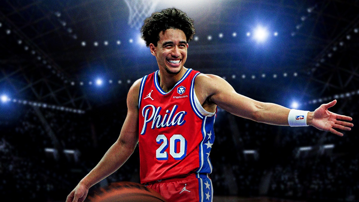 image of Sixers Jared McCain smiling and looking happy