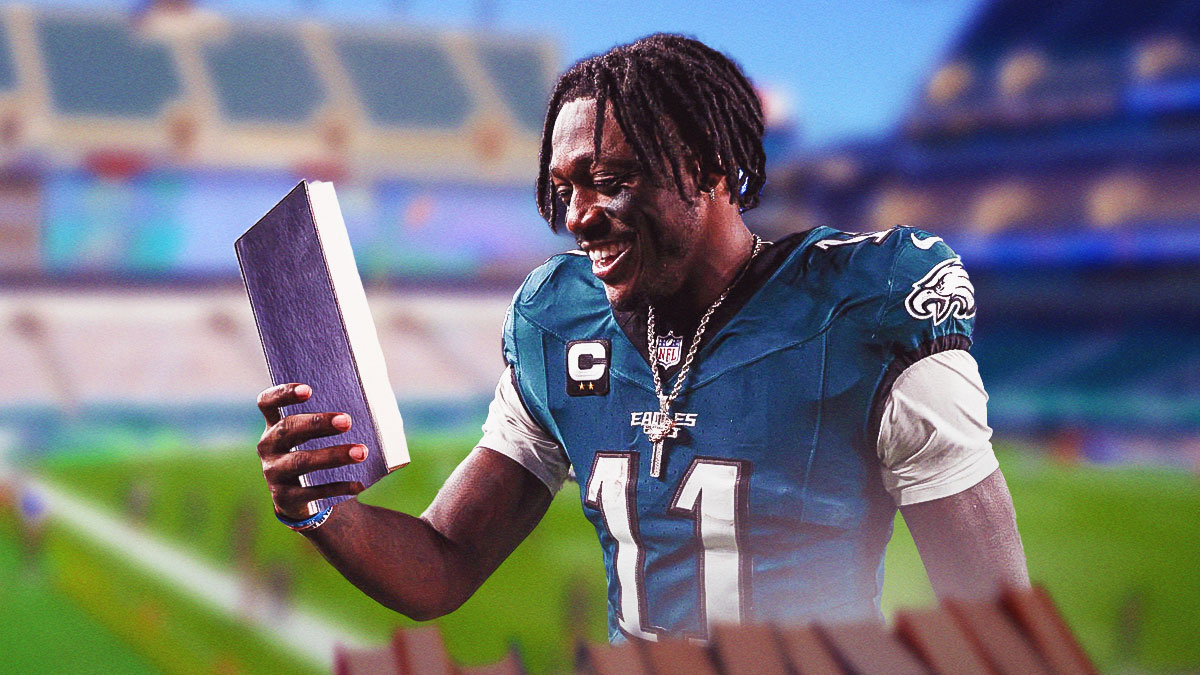 Aj Brown reading a book