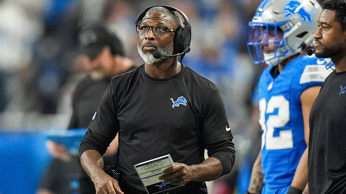 Detroit Lions defensive coordinator Aaron Glenn watches a replay during the first half of the 45-31 loss to the Washington Commanders in the NFC divisional round of the NFL playoffs 