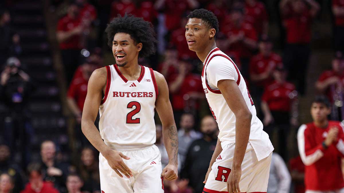 Rutgers Scarlet Knights guard Dylan Harper (2) celebrates in front of guard Ace Bailey (4) during the second half against the UCLA Bruins at Jersey Mike's Arena.