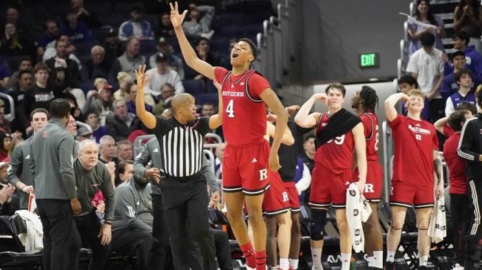 Rutgers Scarlet Knights guard Ace Bailey (4) celebrates a three point basket against the Northwestern Wildcats during the second half at Welsh-Ryan Arena.