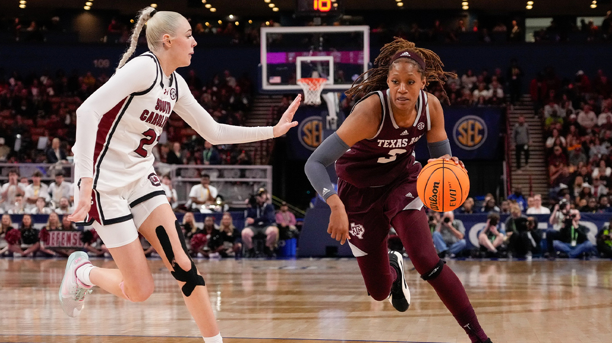 Texas A&M Aggies guard Aicha Coulibaly (5) drives to the basket defended by South Carolina Gamecocks forward Chloe Kitts (21) during the second half at Bon Secours Wellness Arena.