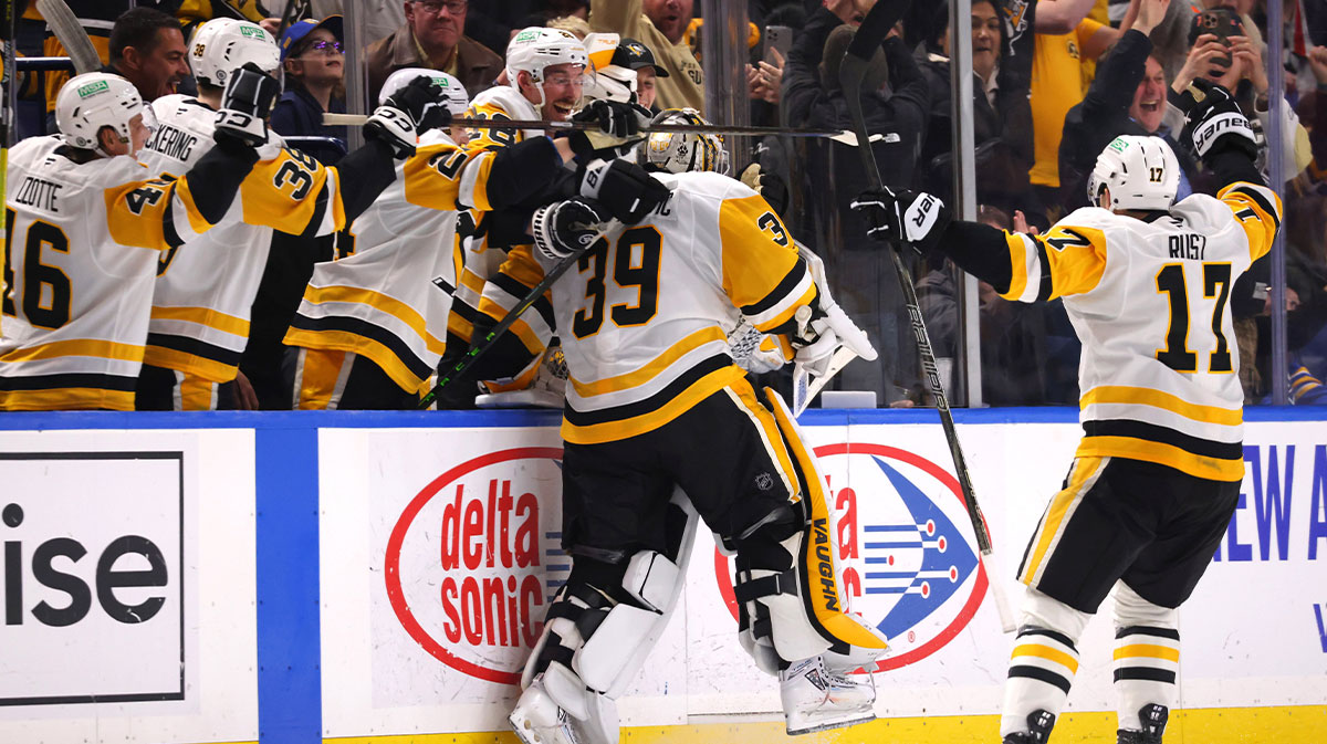 Pittsburgh Penguins goaltender Alex Nedeljkovic (39) celebrates his goal with teammates during the third period against the Buffalo Sabres at KeyBank Center.