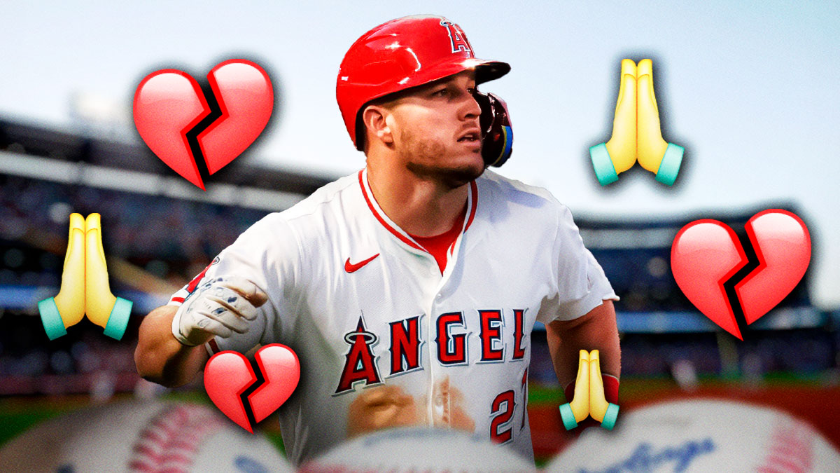 Mike Trout with a broken heart and prayer hands.