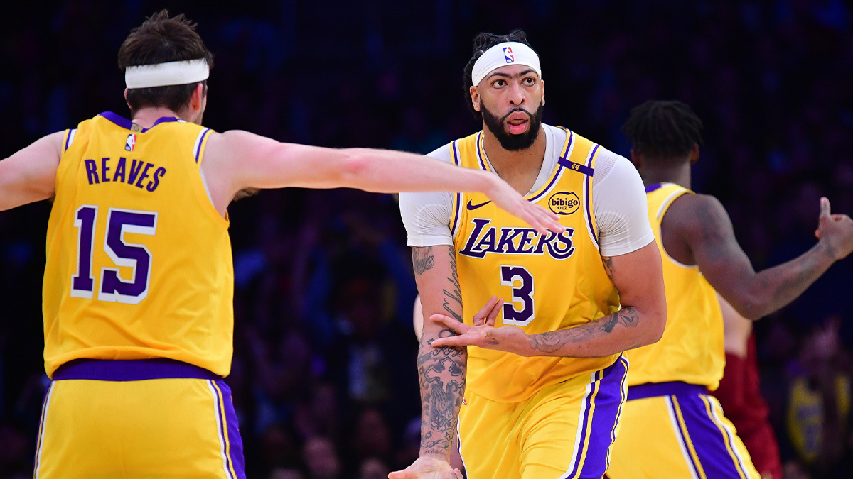 Los Angeles Lakers forward Anthony Davis (3) reacts after scoring a three point basket against the Cleveland Cavaliers during the second half at Crypto.com Arena.