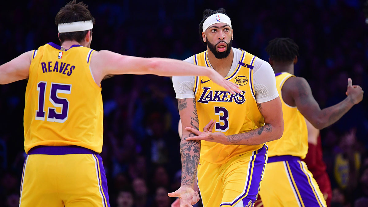 Los Angeles Lakers forward Anthony Davis (3) reacts after scoring a three point basket against the Cleveland Cavaliers during the second half at Crypto.com Arena.