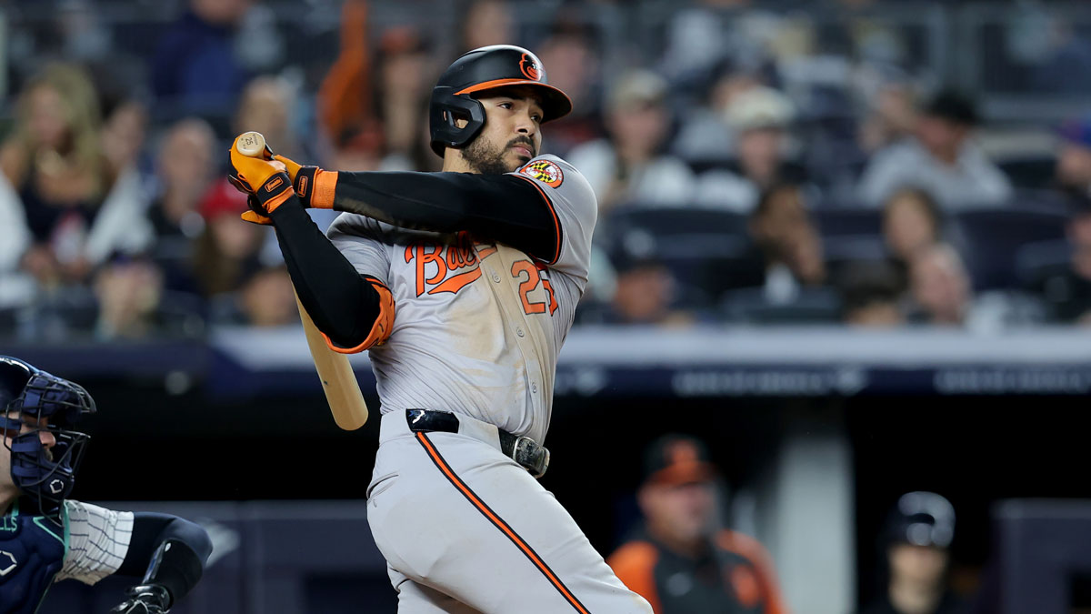 Baltimore Orioles right fielder Anthony Santander (25) follows through on an RBI double against the New York Yankees during the fourth inning at Yankee Stadium