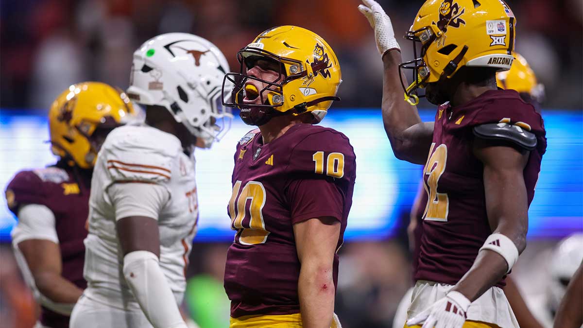 Arizona State Sun Devils quarterback Sam Leavitt (10) reacts after a run against the Texas Longhorns in overtime at Mercedes-Benz Stadium.