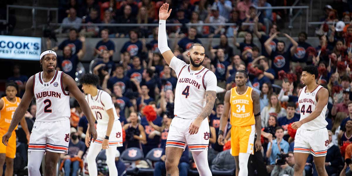 Auburn Tigers forward Johni Broome (4) pumps up the crowd as Auburn Tigers take on Tennessee Volunteers at Neville Arena in Auburn, Ala., on Saturday, Jan. 25, 2025. Auburn Tigers defeated Tennessee Volunteers 53-51.