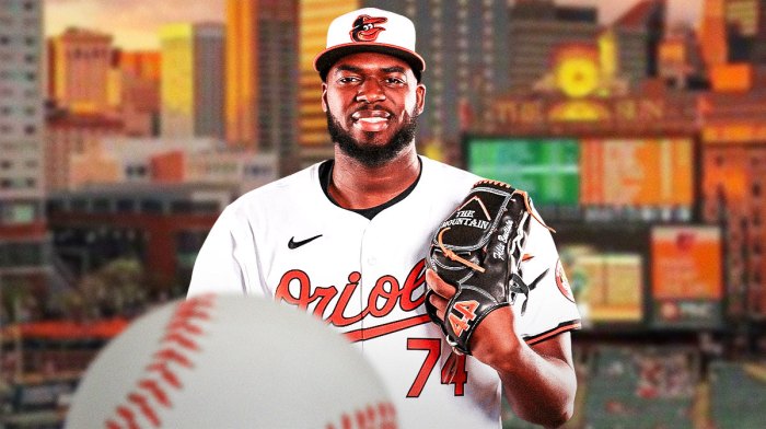 Felix Bautista smiles in Orioles jersey