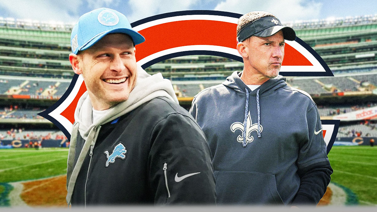 Bears head coach Ben Johnson smiling and standing next to former Saints head coach Dennis Allen. Bears logo in background. Background is Soldier Field.