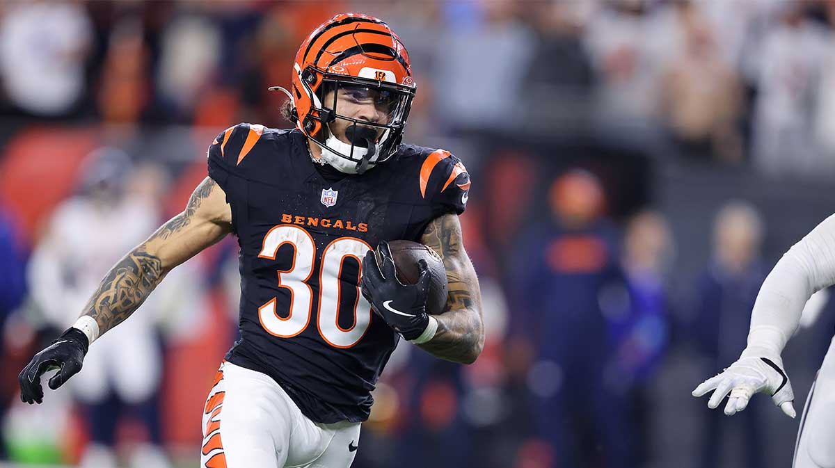 Cincinnati Bengals running back Chase Brown (30) runs the ball during the fourth quarter against the Denver Broncos at Paycor Stadium.