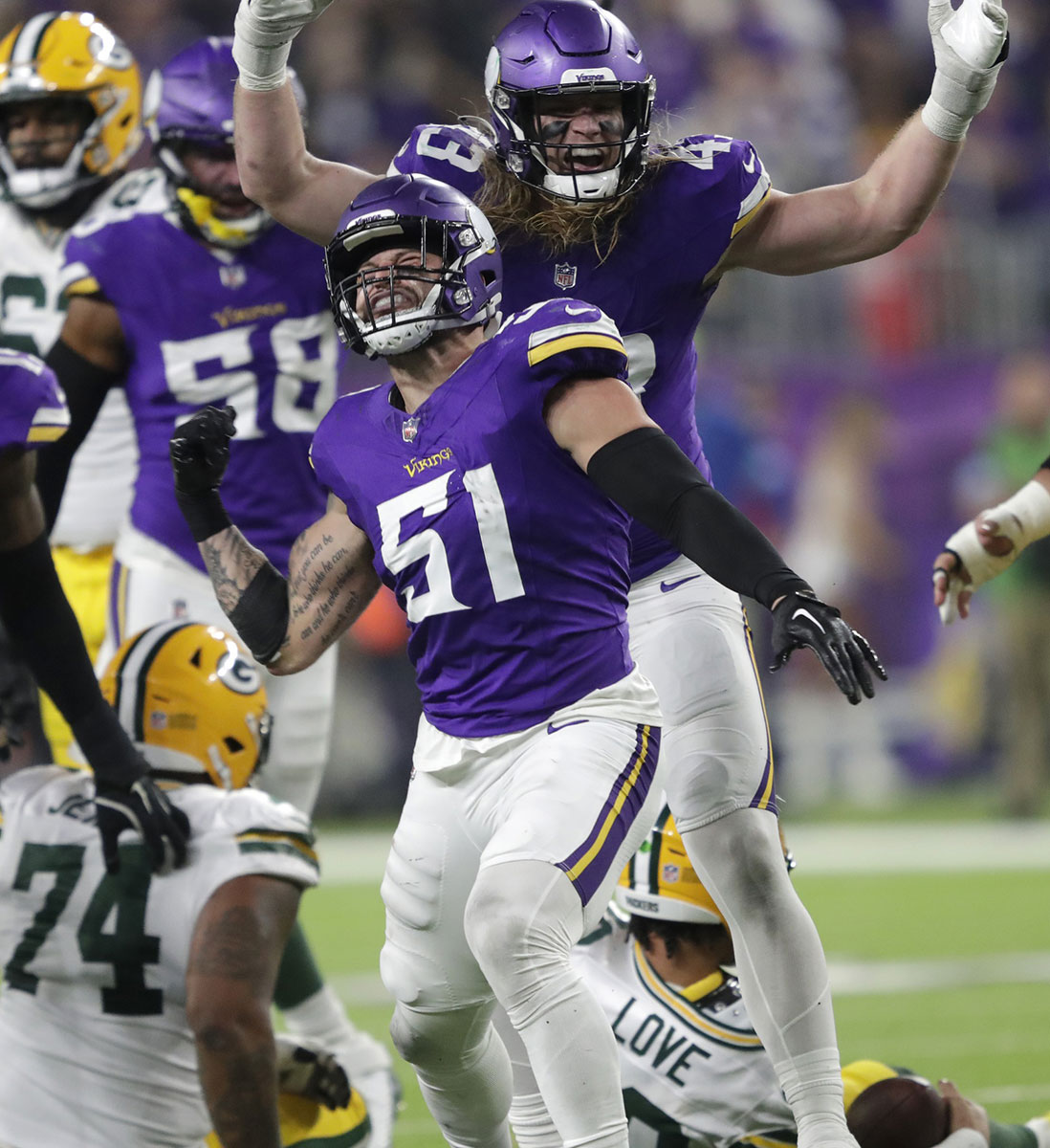 Minnesota Vikings linebacker Blake Cashman (51) celebrates sacking Green Bay Packers quarterback Jordan Love (10) in the fourth quarter during their football game Sunday, December 29, 2024, at U.S. Bank Stadium in Minneapolis, Minnesota.
