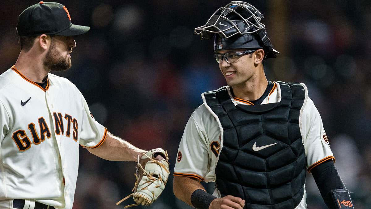 San Francisco Giants starting pitcher Tristan Beck (43) and catcher Blake Sabol (2) react after ending the top of the the seventh inning against the St. Louis Cardinals at Oracle Park.